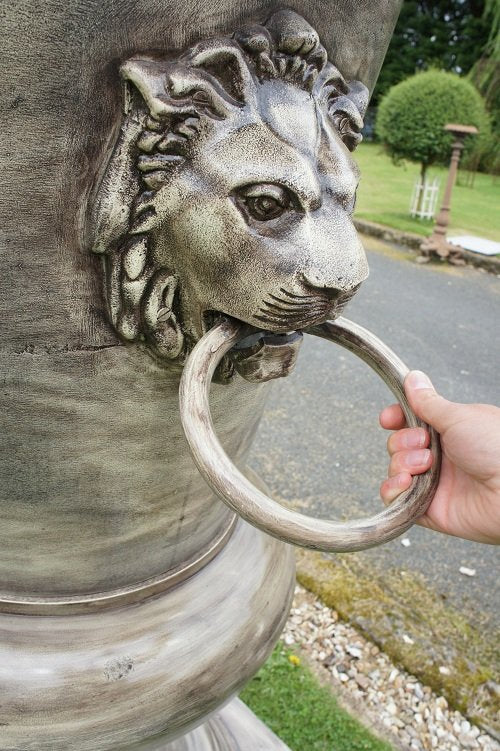 lion and handle detail.