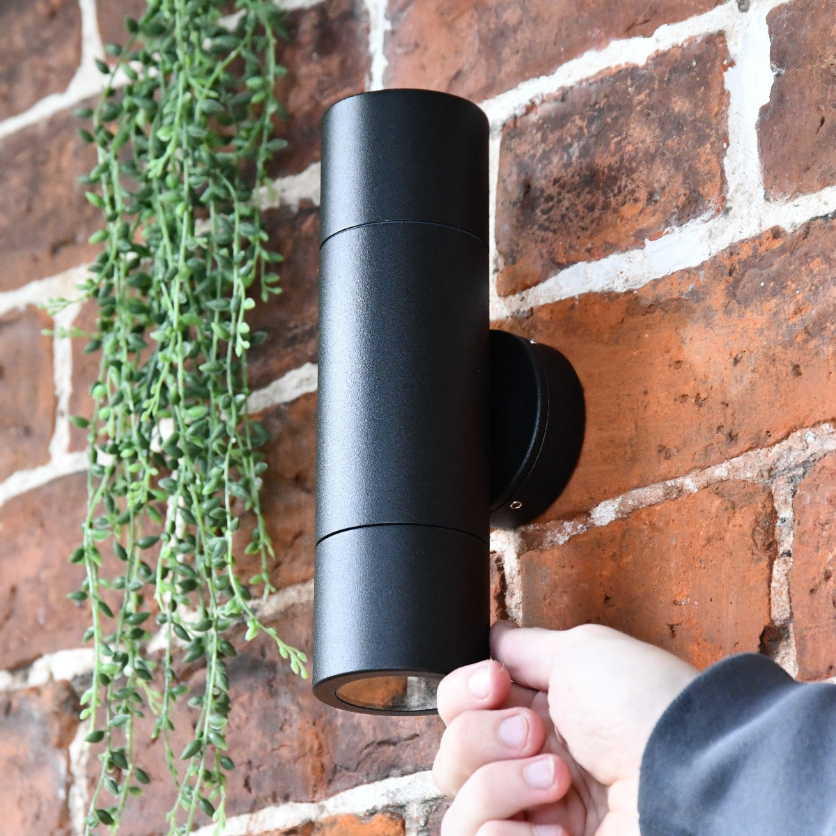 life size scale of the Modern Black Cylindrical Wall Spotlight