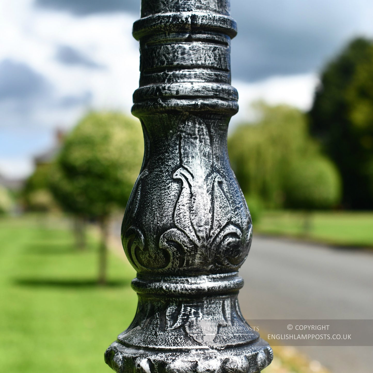 Ornate Detailing On Antique Silver Lamp Post
