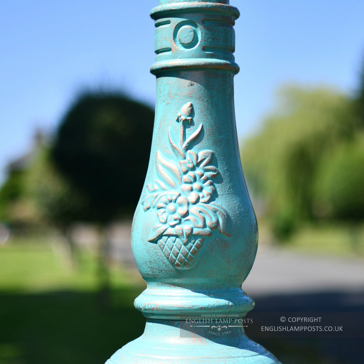 Ornate Detailing On Blue Cast Iron Lamp Post Column