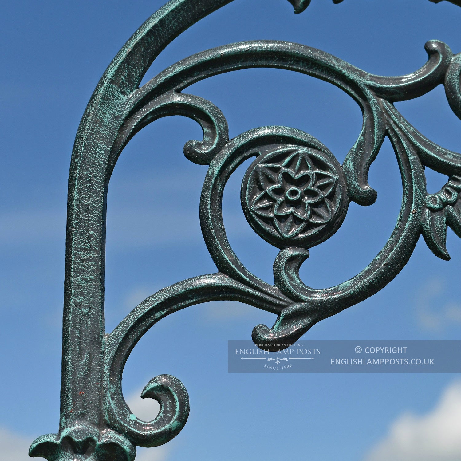 Ornate Scroll Bracket On Blue Lamp Post Column