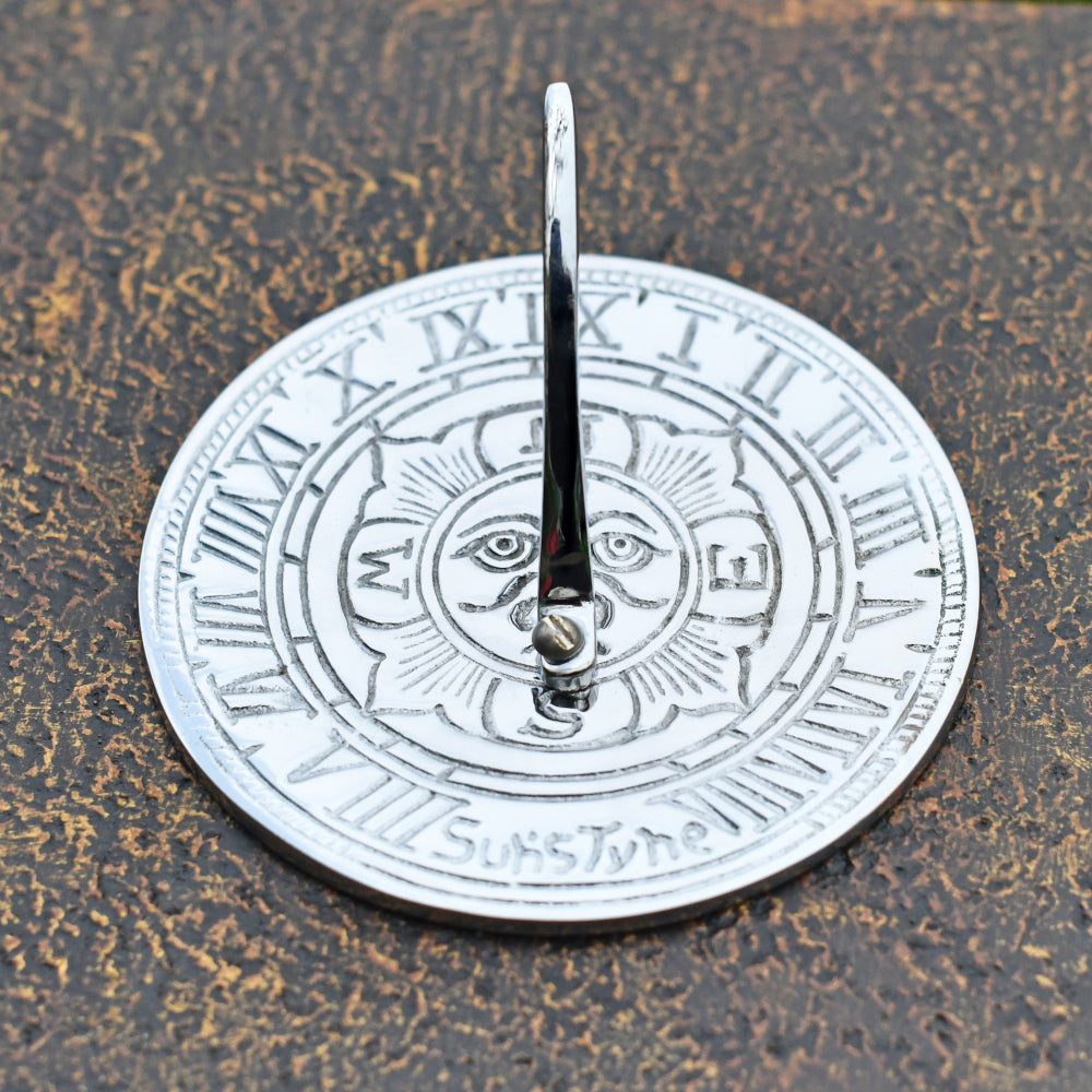 Overhead shot of the chrome compass sundial