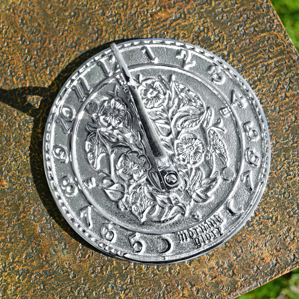 Overhead view of the 'Bushmead' Floral Motif Chrome Sundial