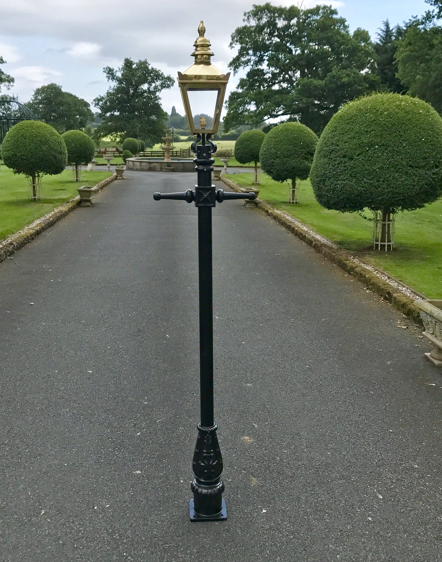 Polished Brass Victorian Lamp Post On Driveway