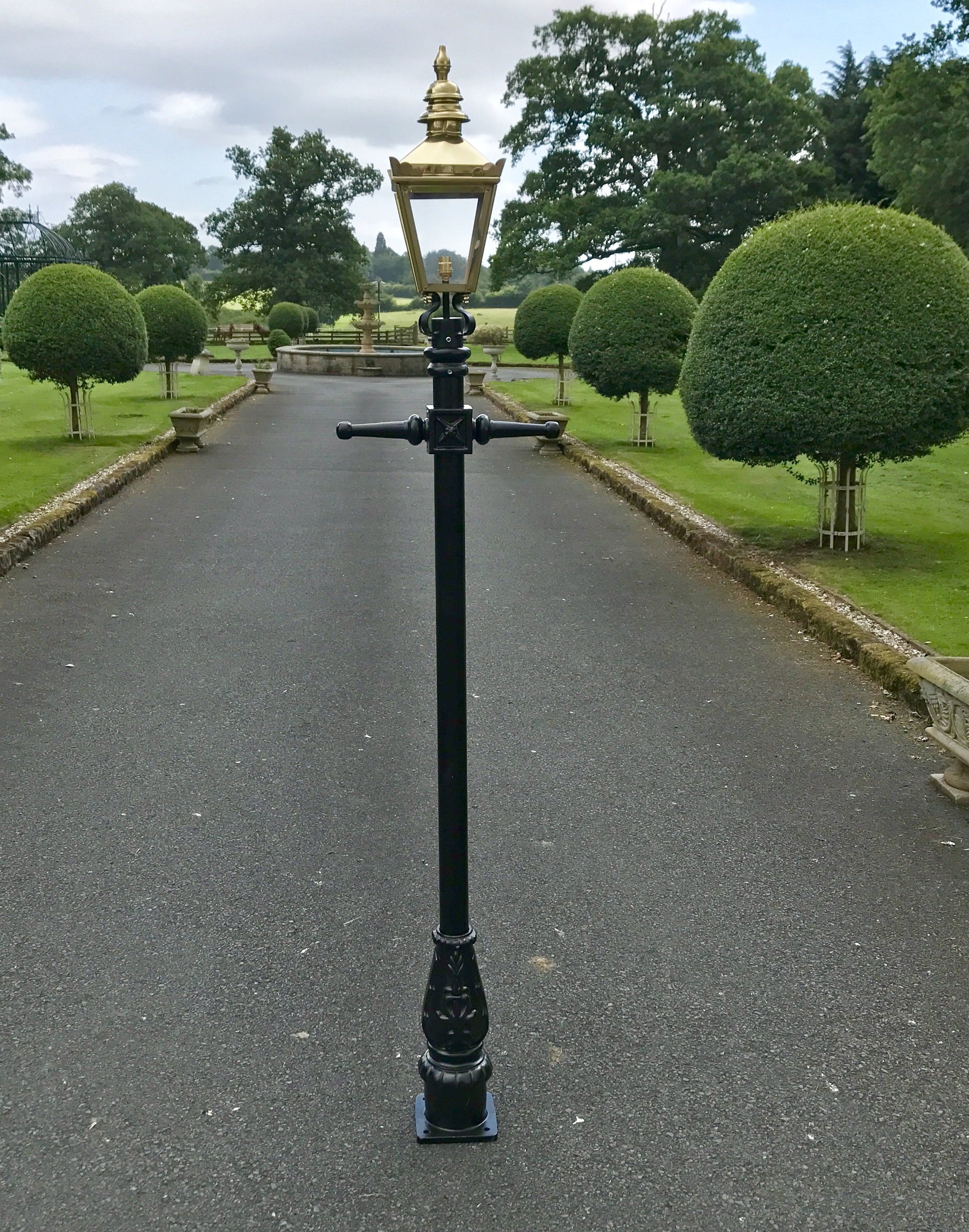 Polished Brass Victorian Lamp Post On Driveway