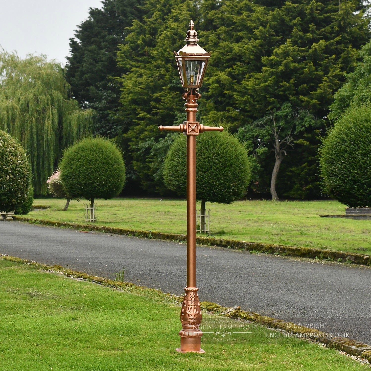 Polished Copper and Rose Gold Kensington Lamp Post 2.25m In Garden Setting