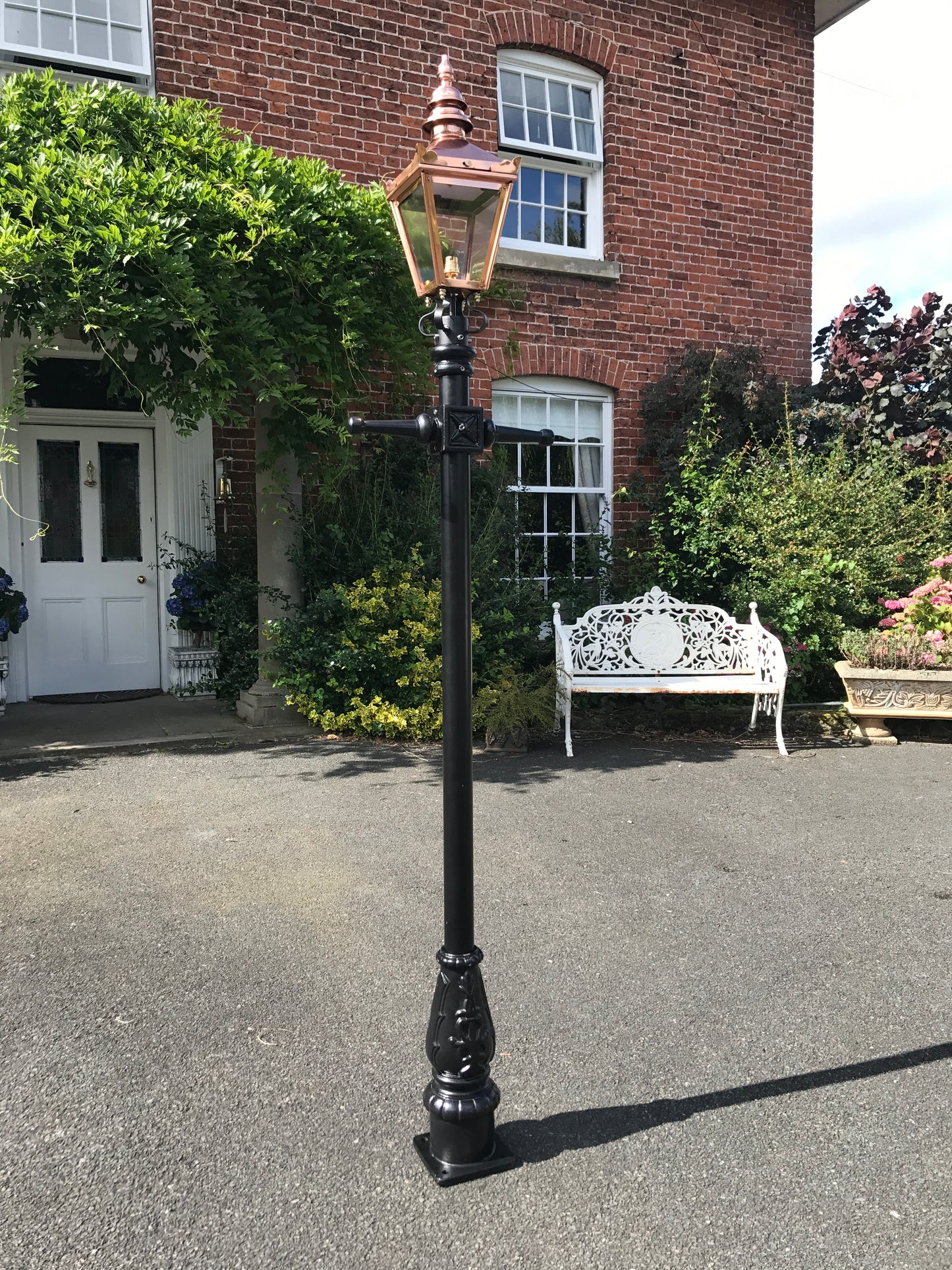 Polished Copper Lamp Post In Front of Georgian House