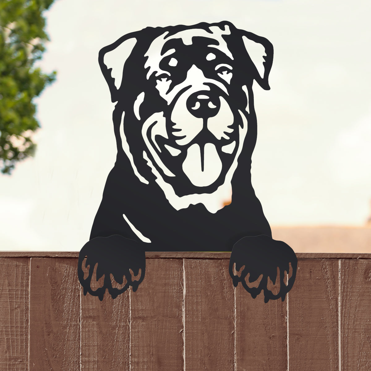The 'Rottweiler' topper on a brown fence