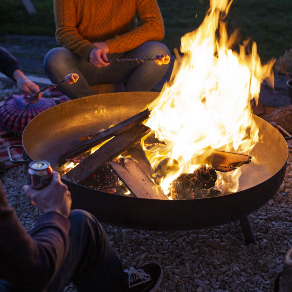 Steel fire pit at night time 