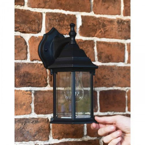 Traditional Black Victorian Top-Fix Wall Lantern With Hand For Scale 