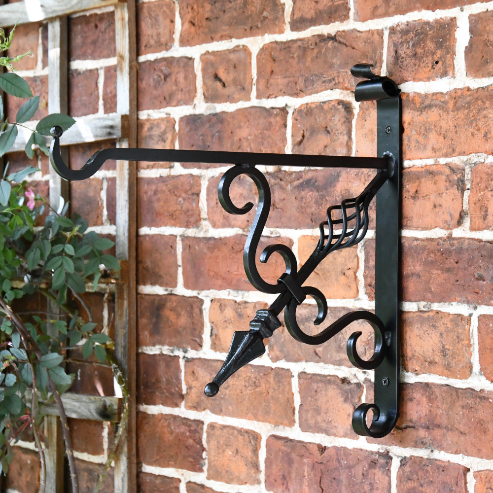 Angled view of scrolled hanging basket bracket