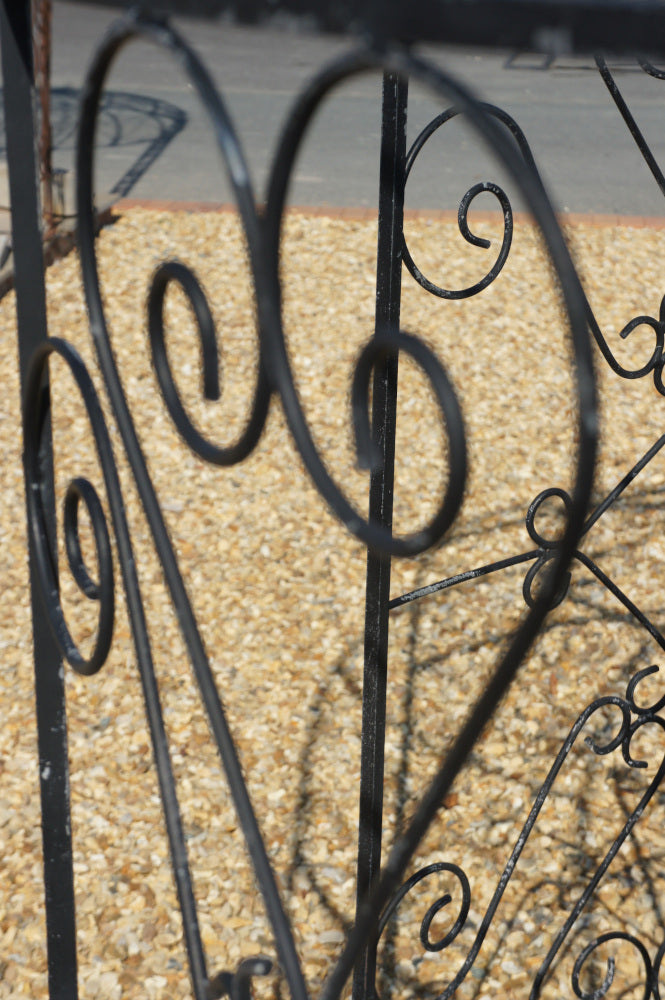 Close up view of the heart shaped scrollwork