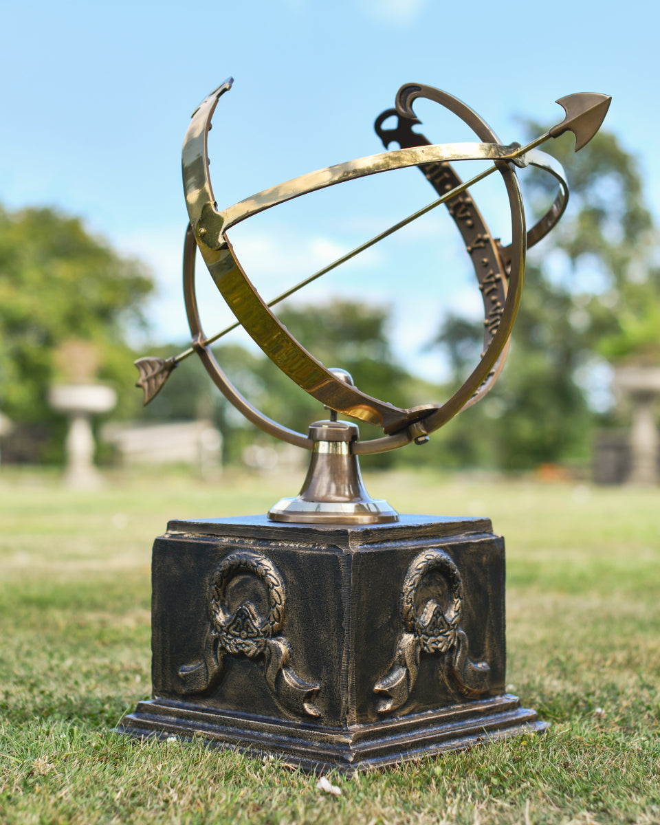 The ornate pillar with an armillary on top