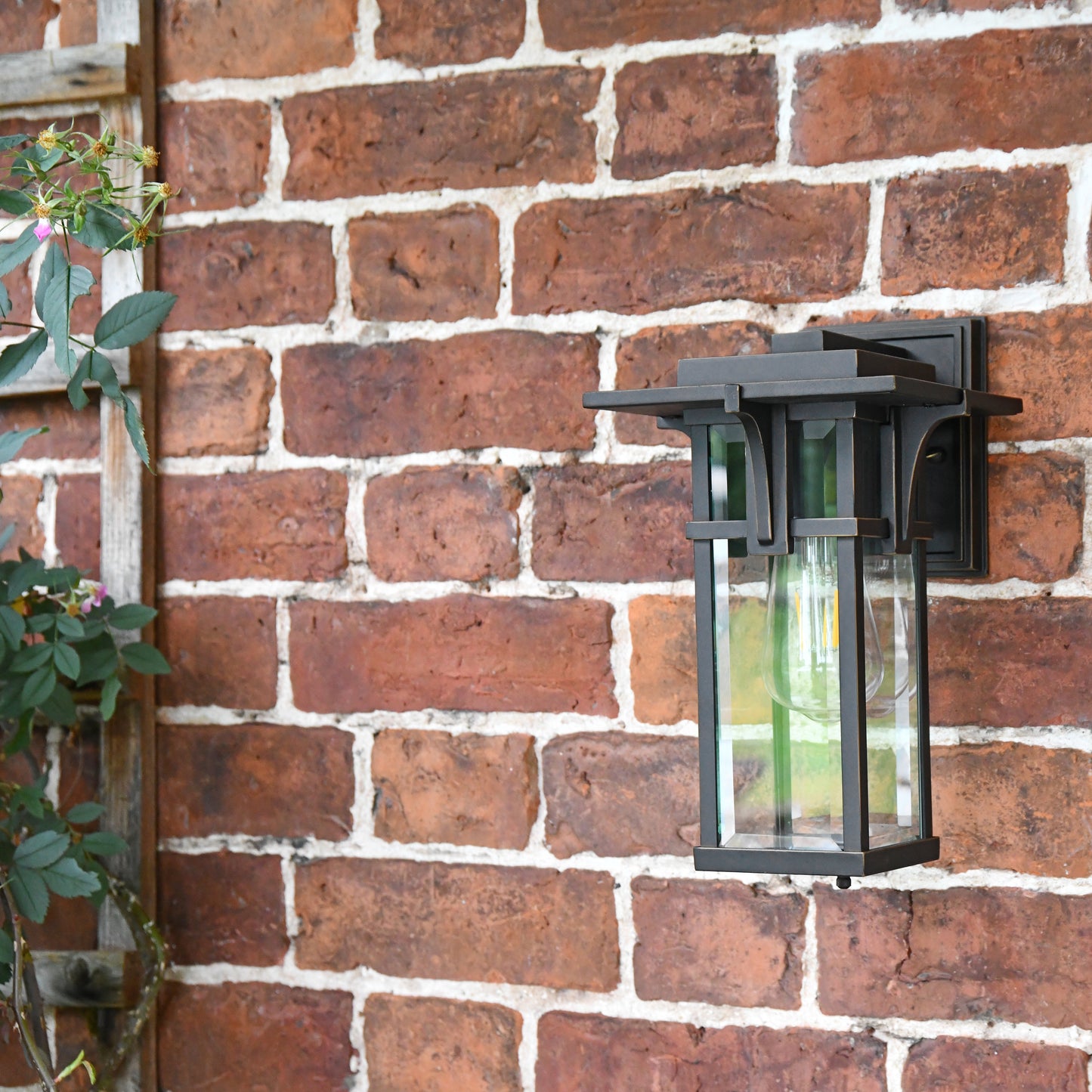 Angled view of the 'Dalton' attached to a red brick wall 