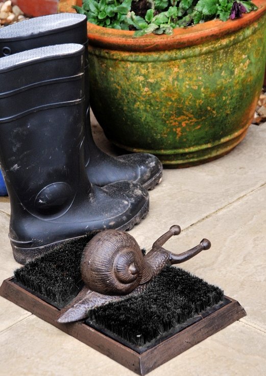 Rustic brown snail boot brush and remover