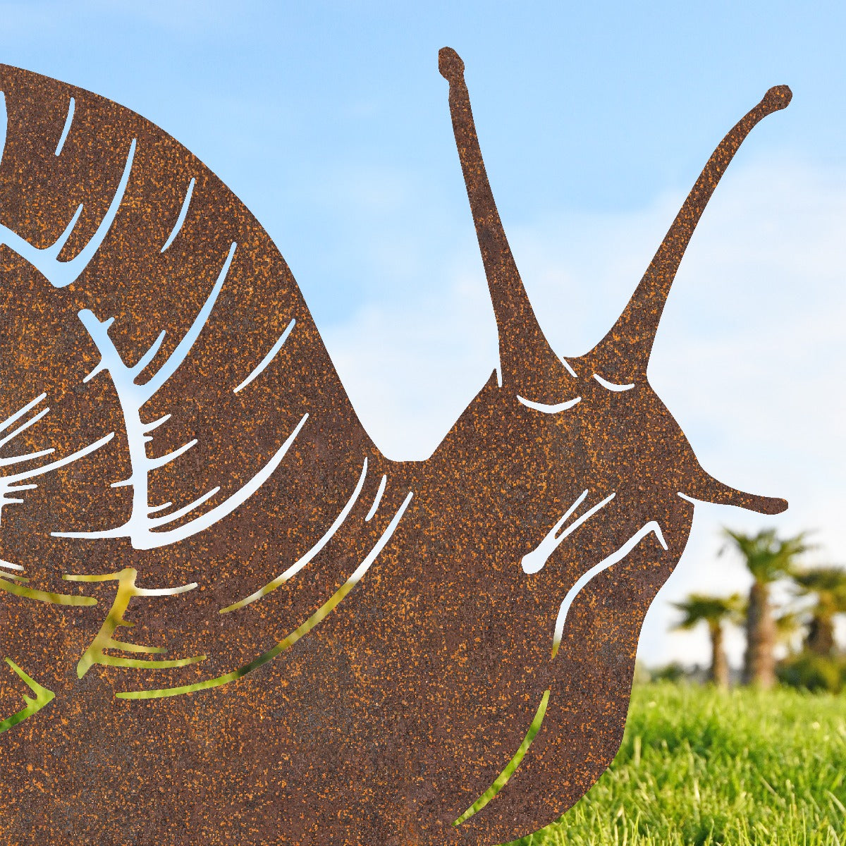 Close Up Of Snail Garden Sheet Steel Silhouette In Rustic