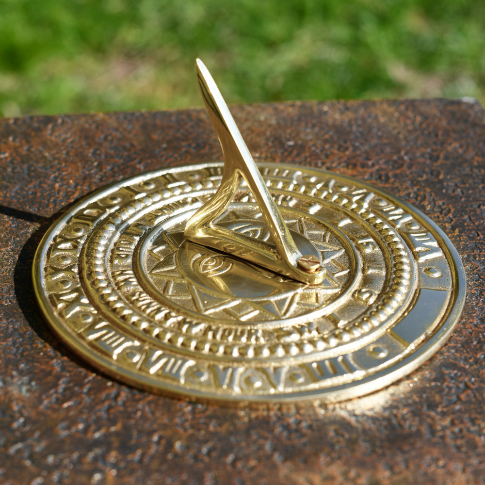 Three quarter view of the engraved sundial