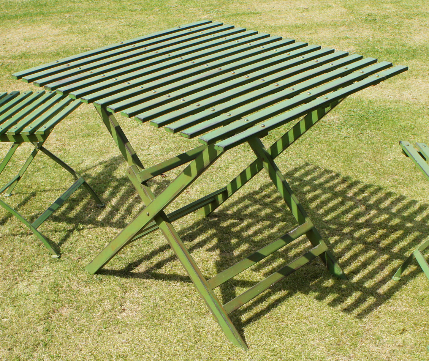 square green table in the garden