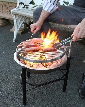 Cooking sausages on grill