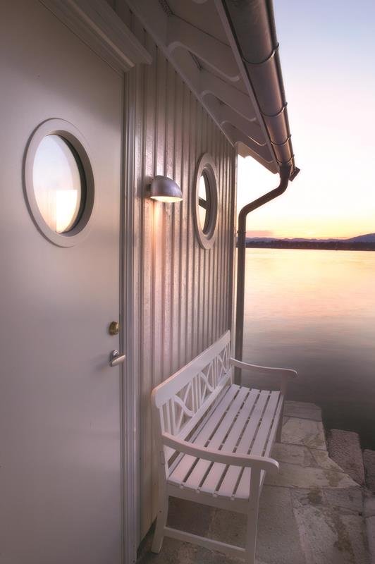 The Crescent Shaped Steel Wall Light in situ 
