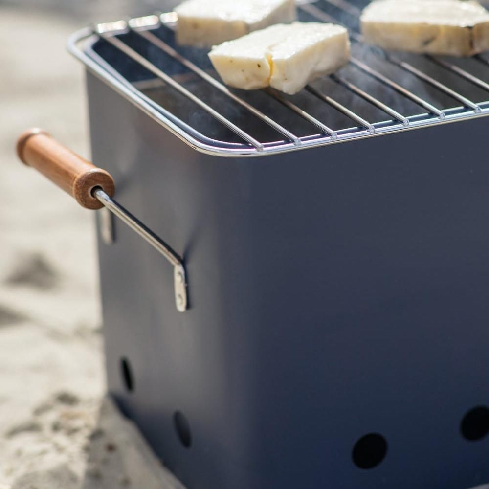 Close up of the edge of the steel BBQ bucket 
