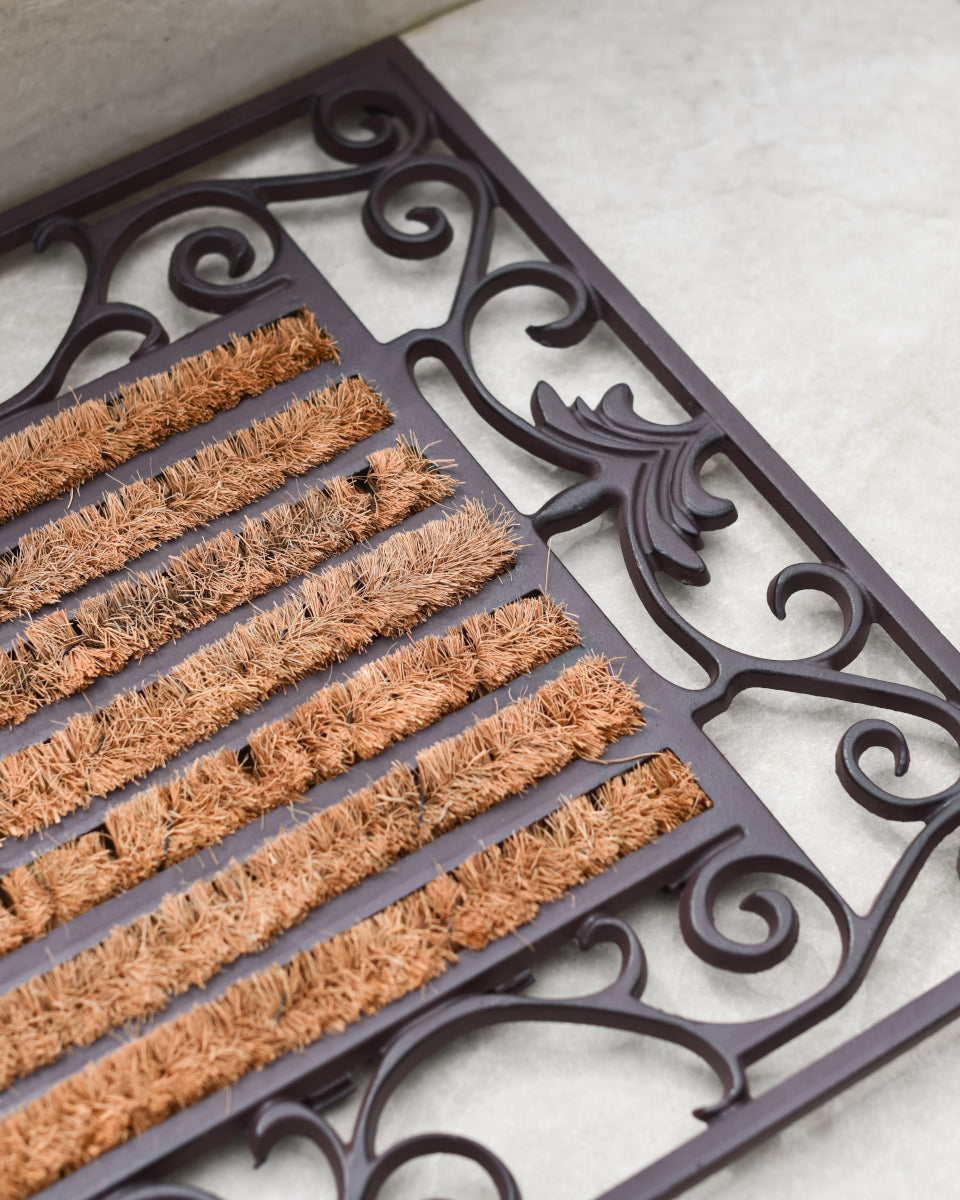 The brown doormat bristles