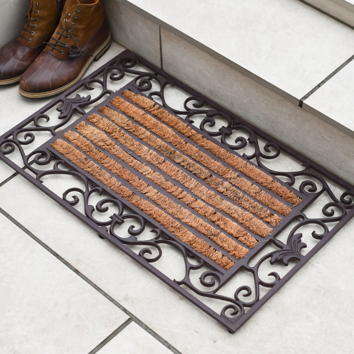 The Cast Iron 'Lunna' Doormat in situ