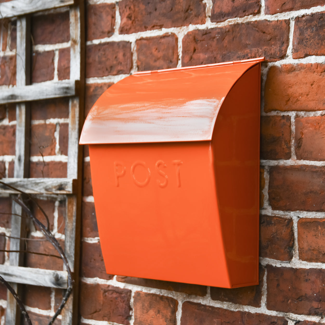 The orange post box in situ