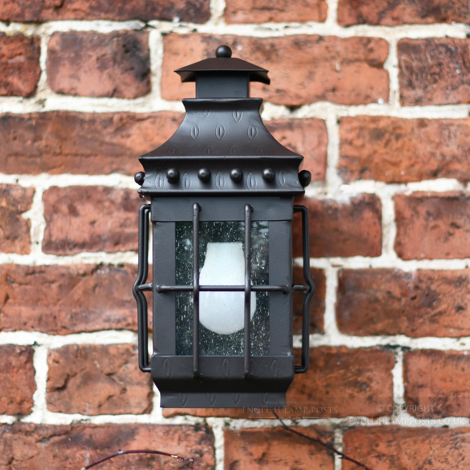 The Westcott Antique Wrought Iron Wall Light Front On