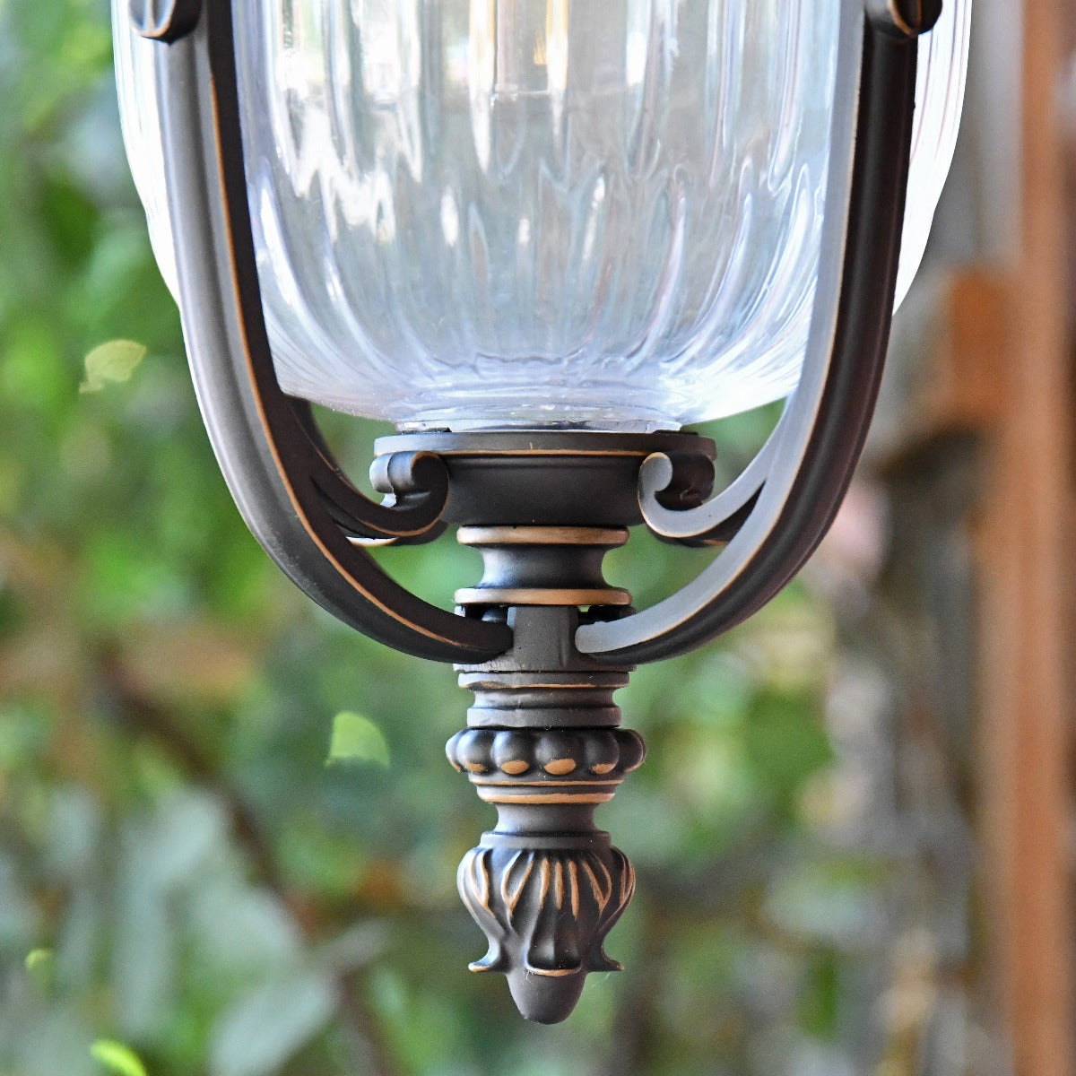 The Wilmont Bronze Ribbed Glass Wall Lantern Bottom Finial