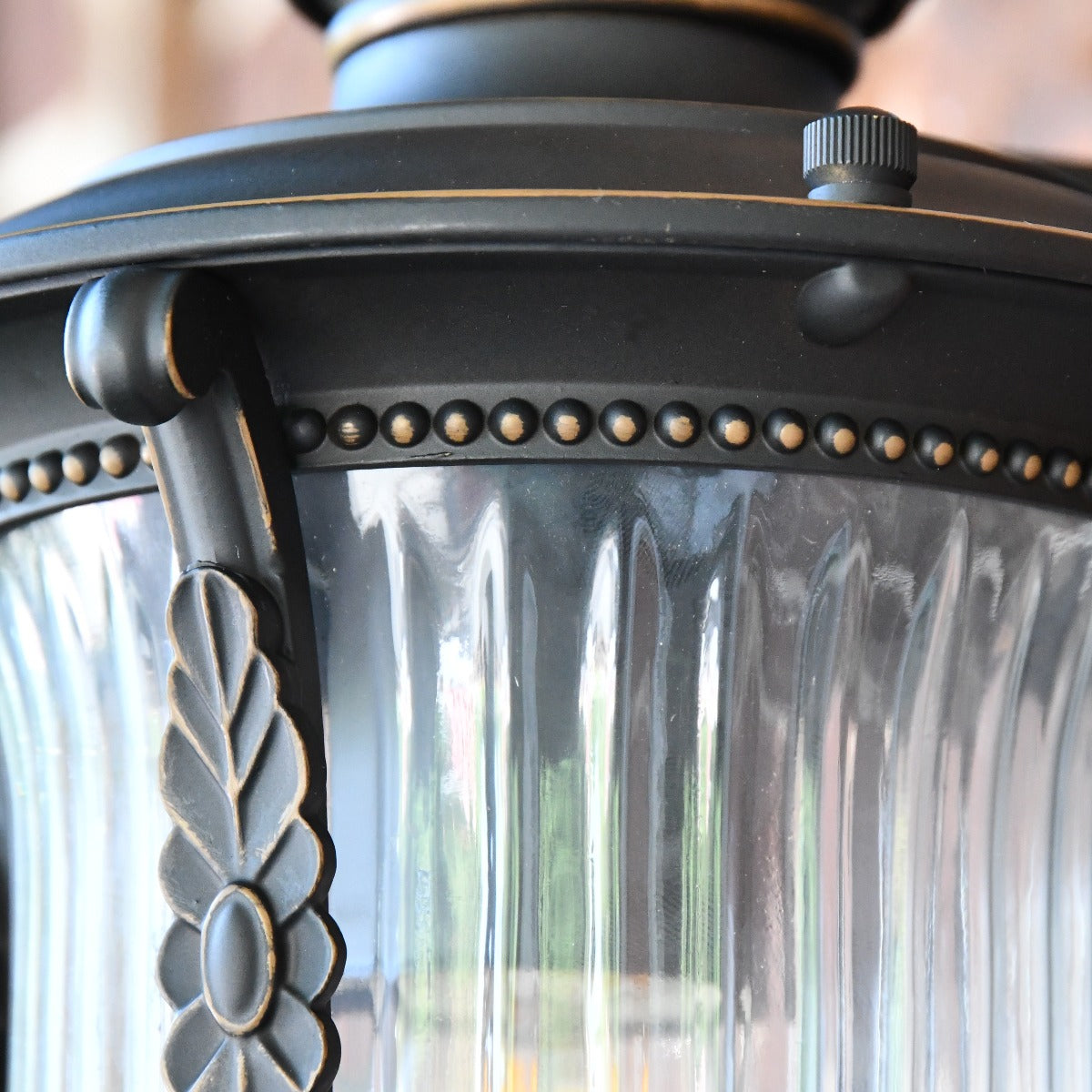 The Wilmont Bronze Ribbed Glass Wall Lantern With Ornate Detailing