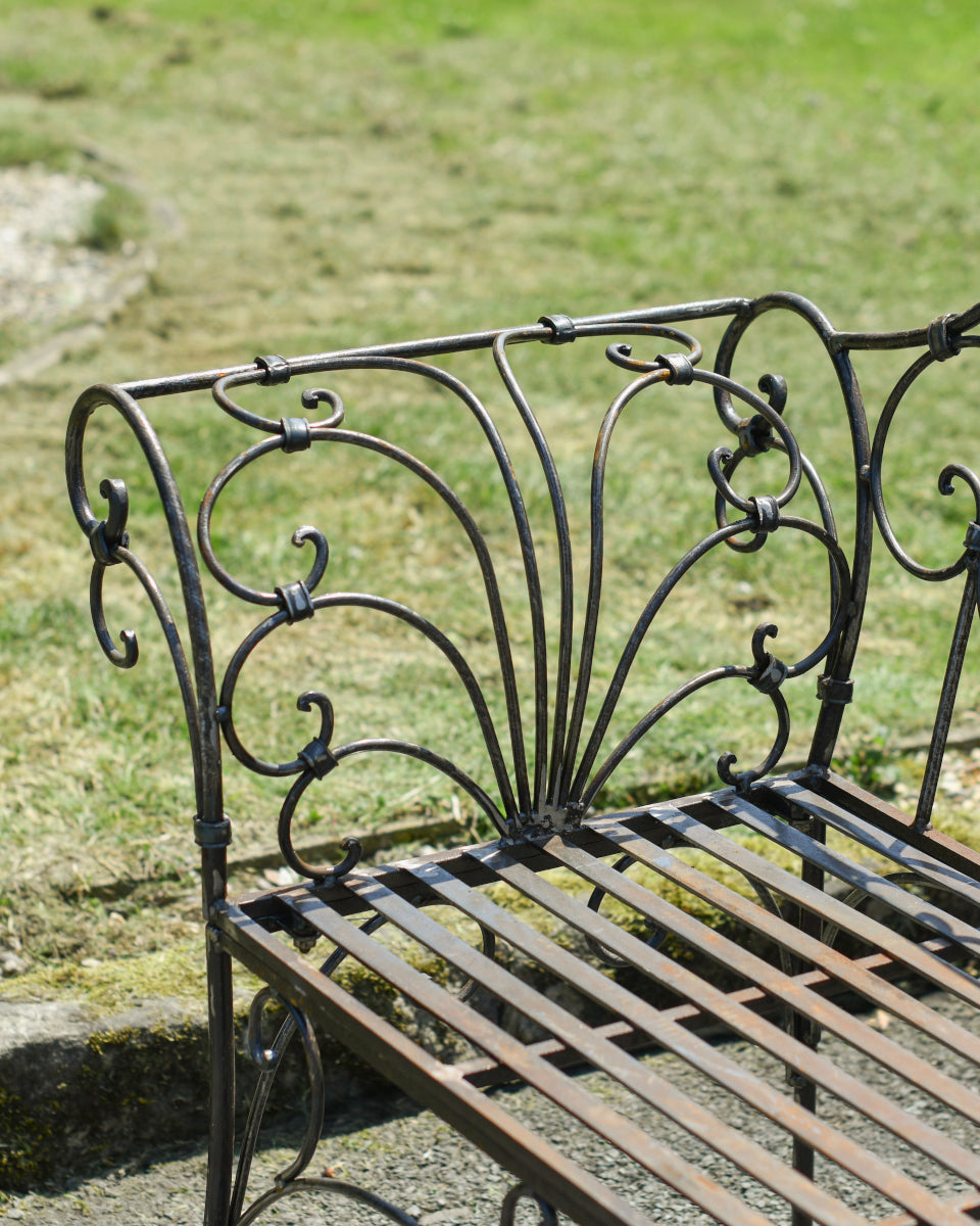 View of iron scrolled armrest