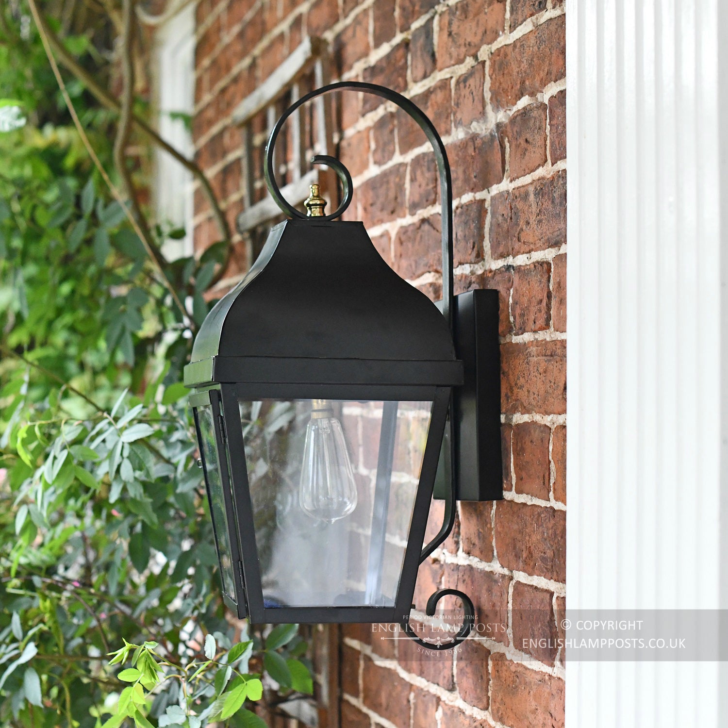 Traditional Black Wall Lantern With Scroll Bracket Side On View
