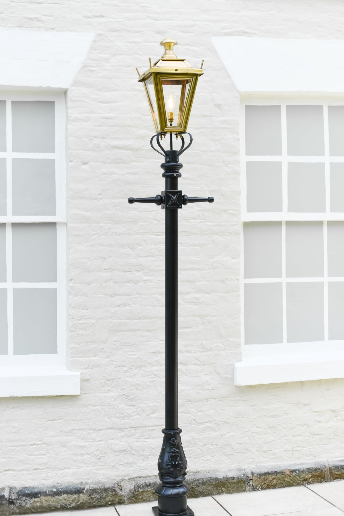 The traditional antique brass lamp post