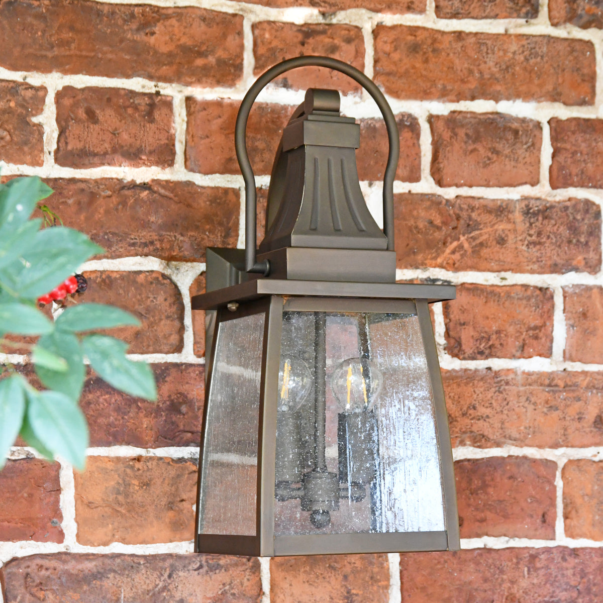 The two light lantern situated outisde a doorway