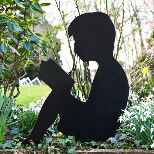 Boy Reading Garden Sheet Steel Silhouette In Black