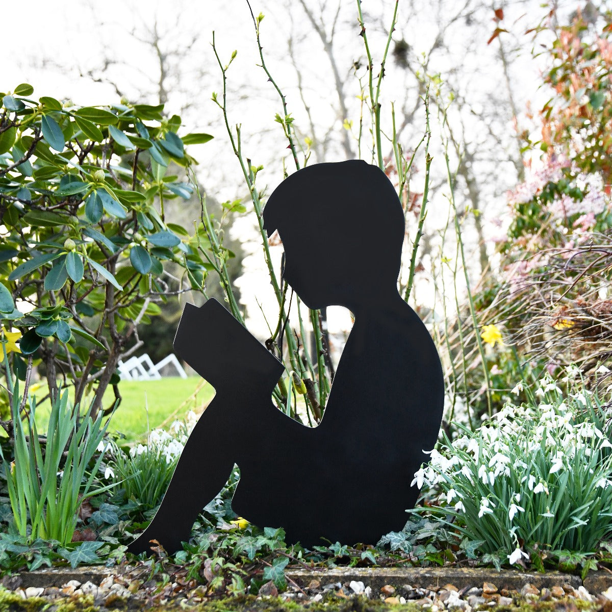 Boy Reading Garden Sheet Steel Silhouette In Black