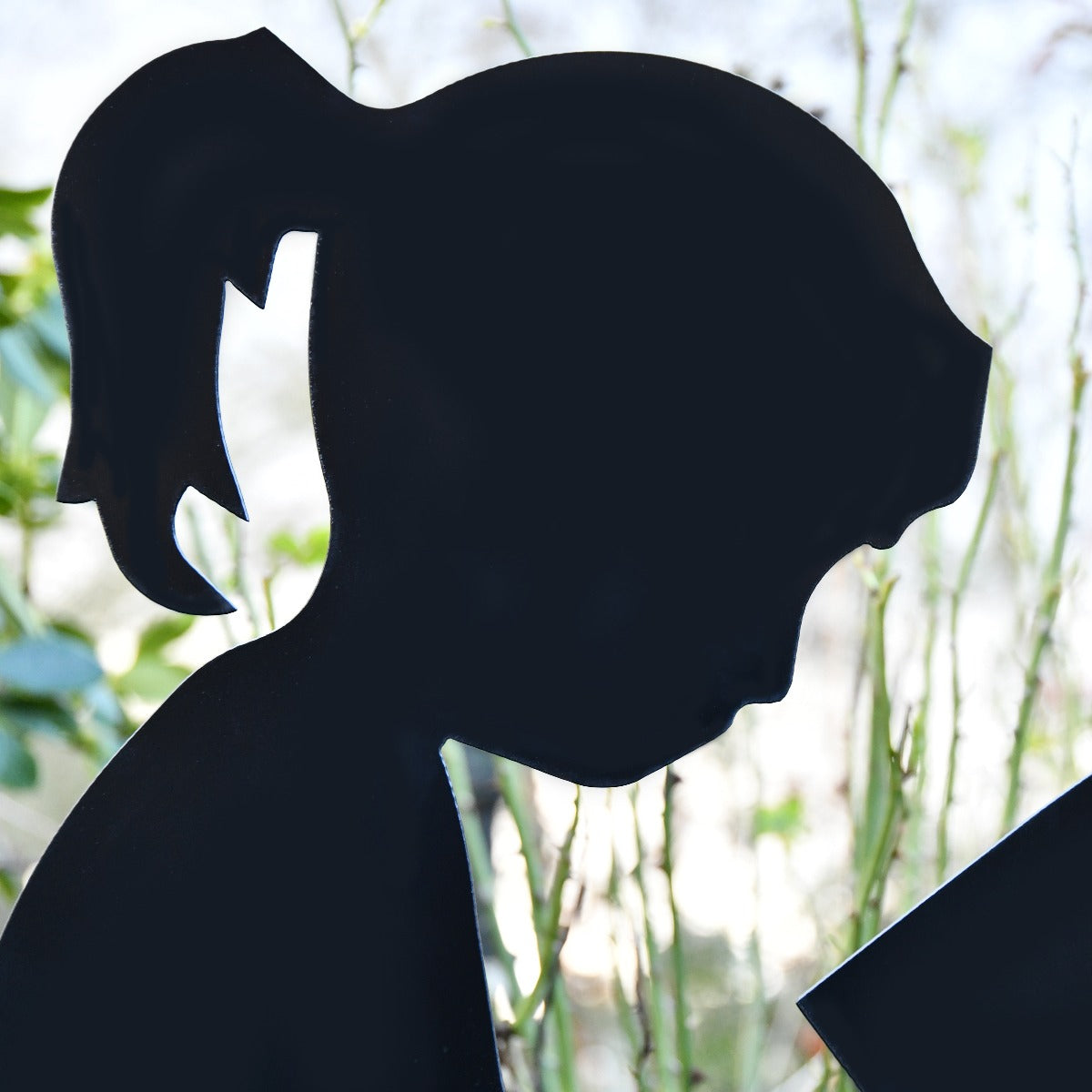 Girl Reading Garden Sheet Steel Silhouette In Black