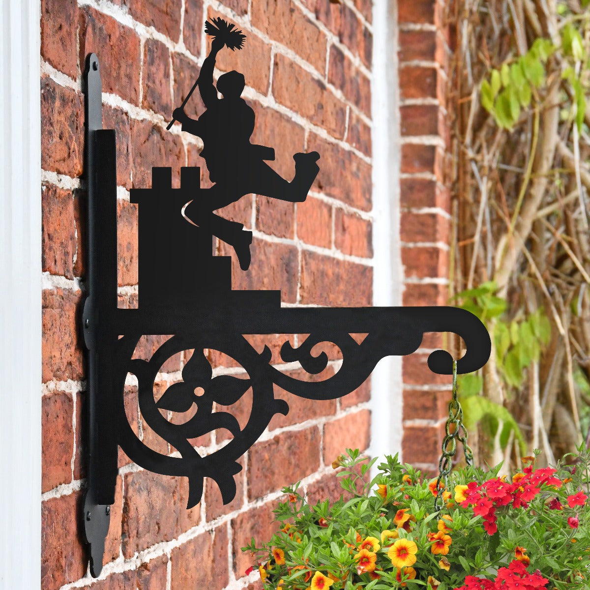 Ornate "Chimney Sweep" Garden Hanging Basket Bracket On Brick Wall