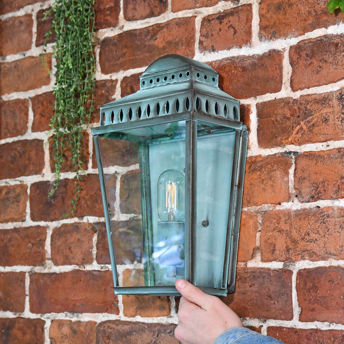 Verdigris Flush Fitting Wall Lantern With Hand For Scale