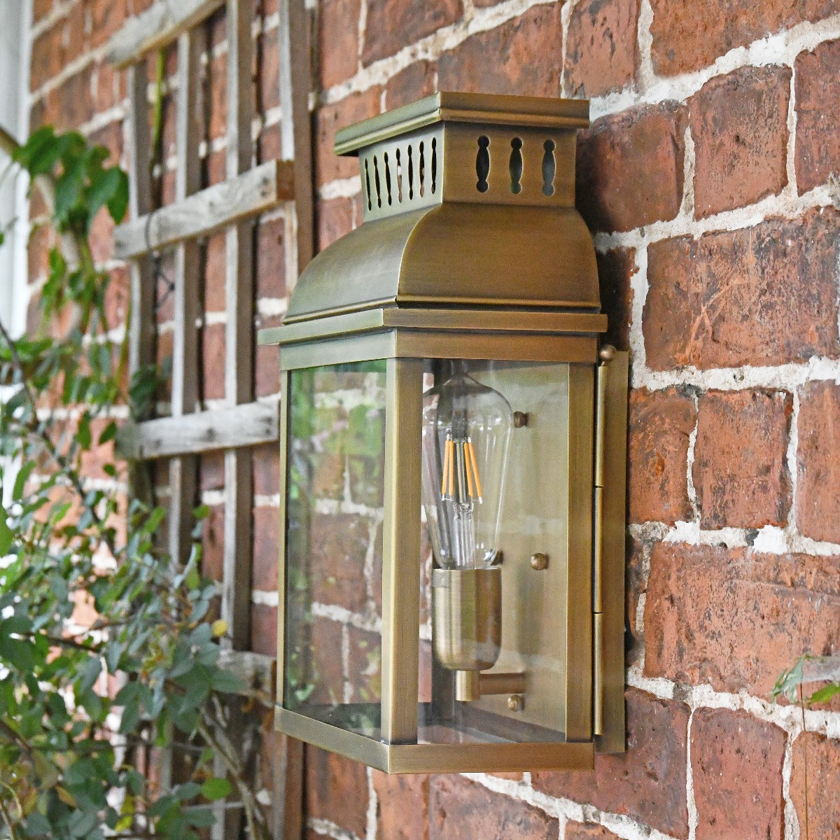 Period Antique Brass Half Wall Lantern On Brick Wall