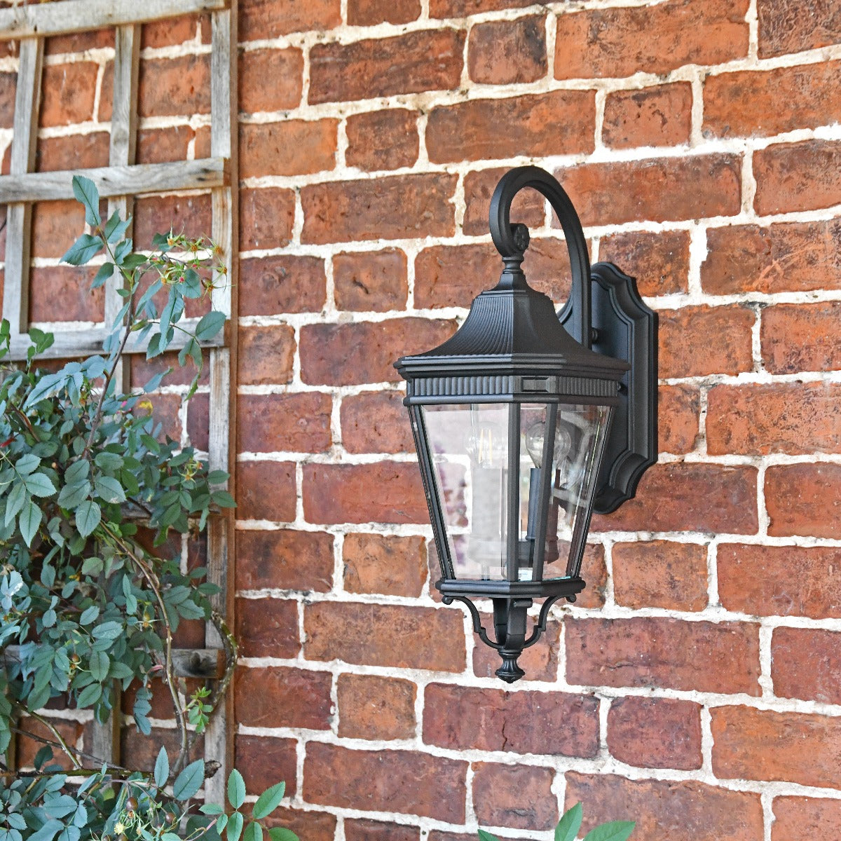 Black Traditional Suspended Wall Lantern On Brick Wall