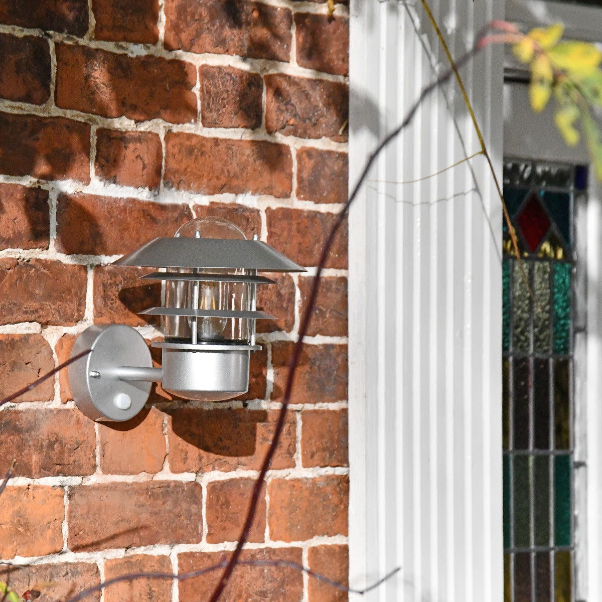 Modern Silver Wall Light Fitted By Front Door