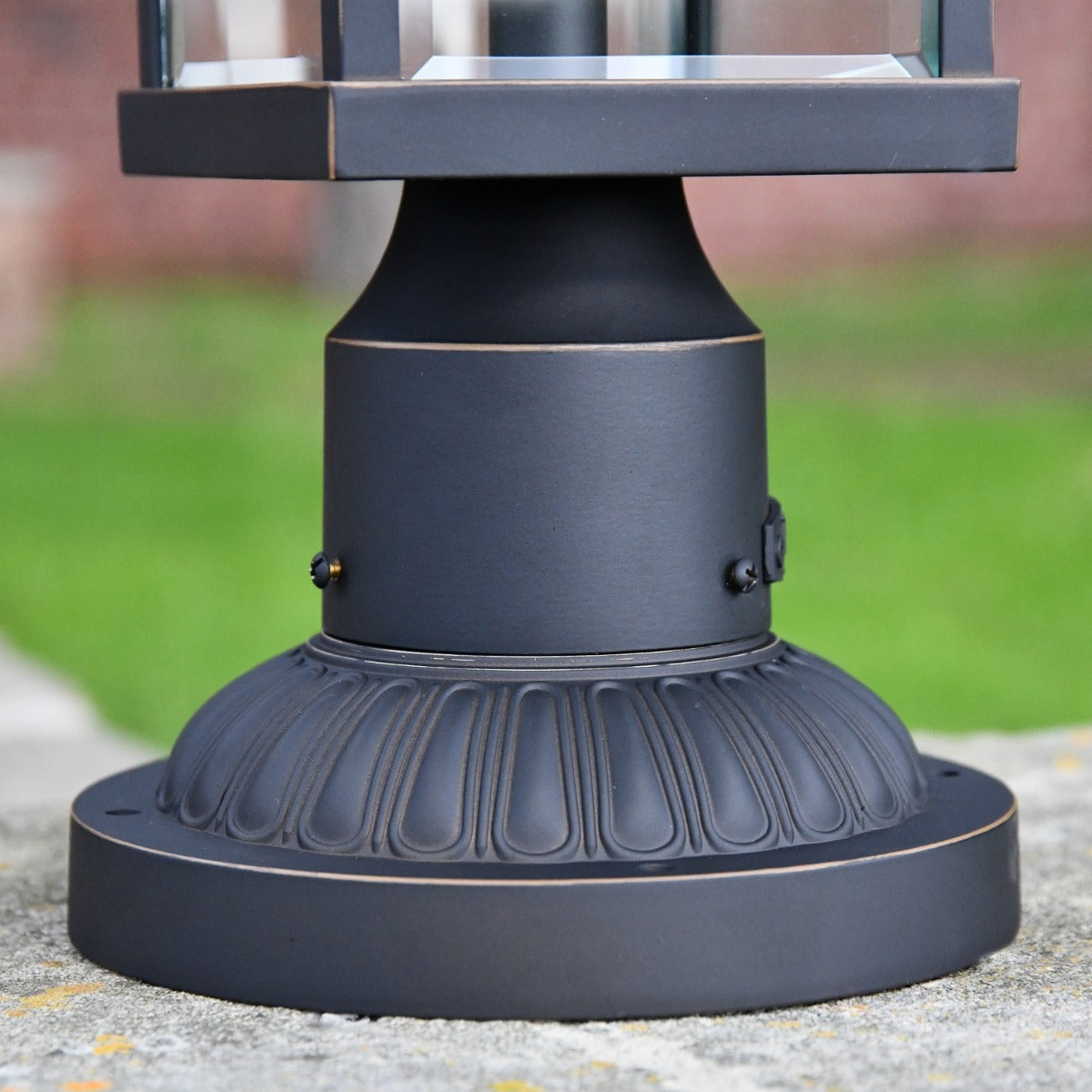 Close up of decorative circular base and lantern 