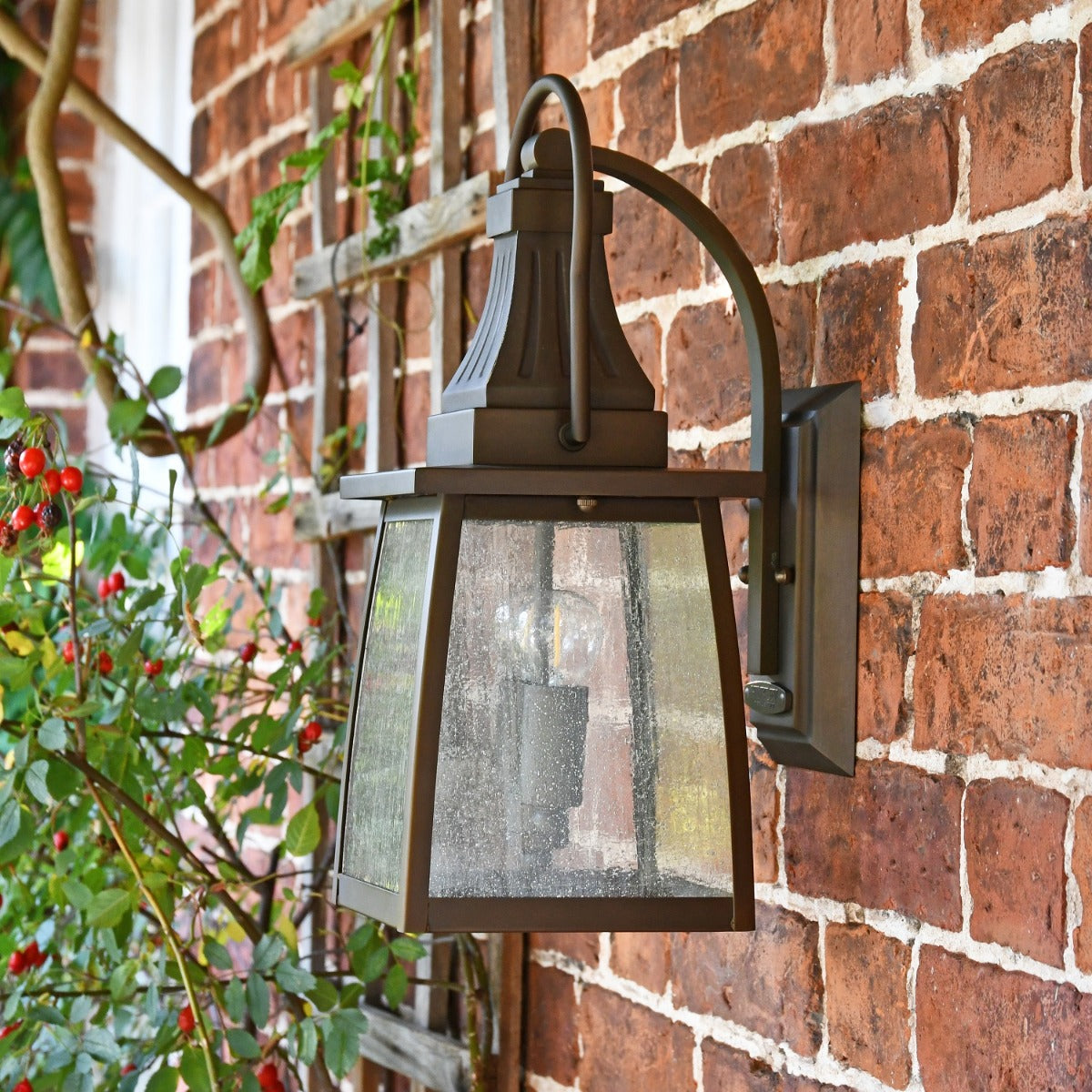 Side view of Colonial Antique Brass Wall Light in Situ 
