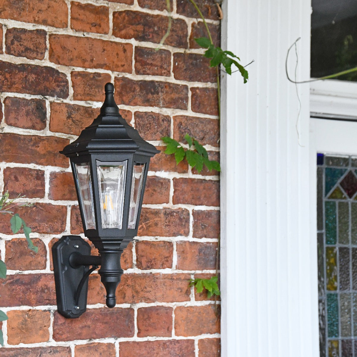 Black Bellvue Reversible Outdoor Wall Lantern Fitted On Brick Wall