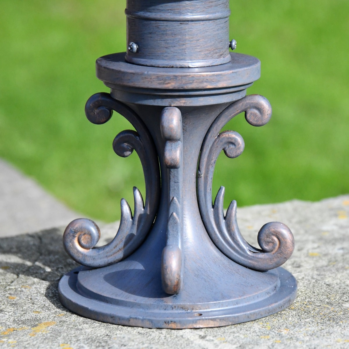 Close up of circular base and decorative embellishment