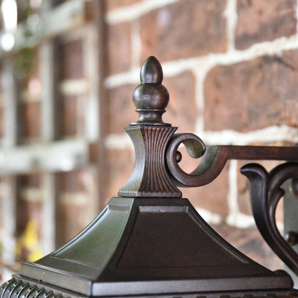 Top Detailing Of Brushed Bronze Renaissance Style Wall Lantern