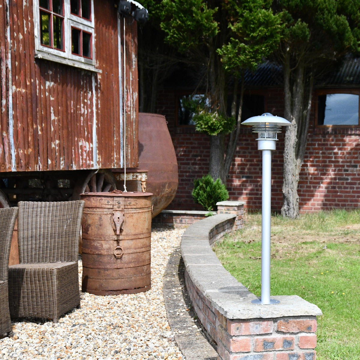 "Sundsvall" Stainless Steel Low-Level Lamp Post In Garden Setting