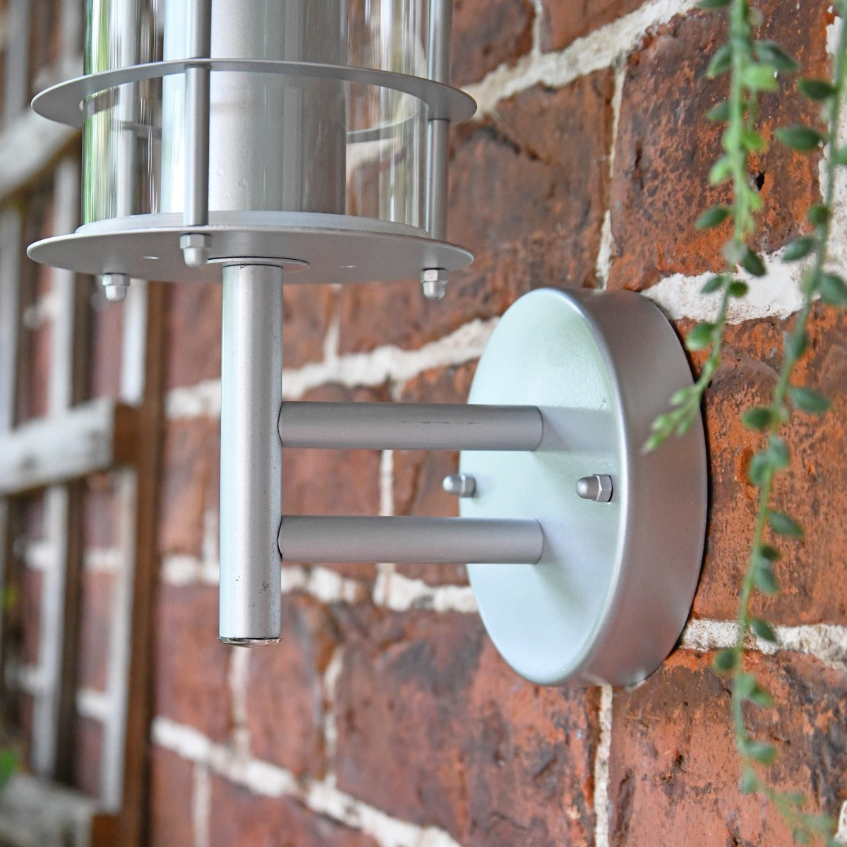 Close up of circular mounting bracket and arm 